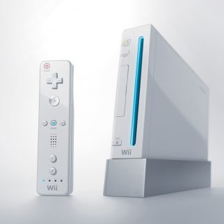Nintendo Wii Pictured Next to Wiimote