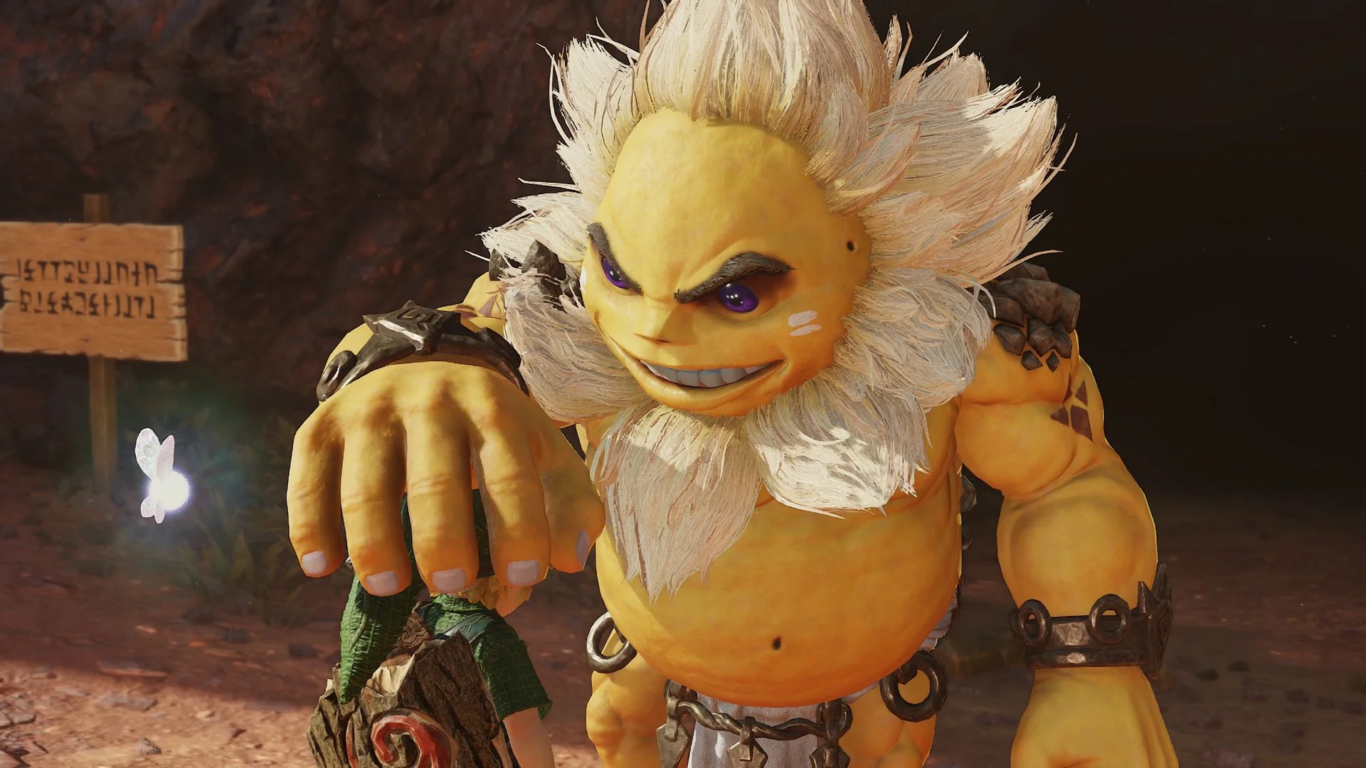 Close-up of Darunia, the Goron chief, reaching toward a glowing fairy