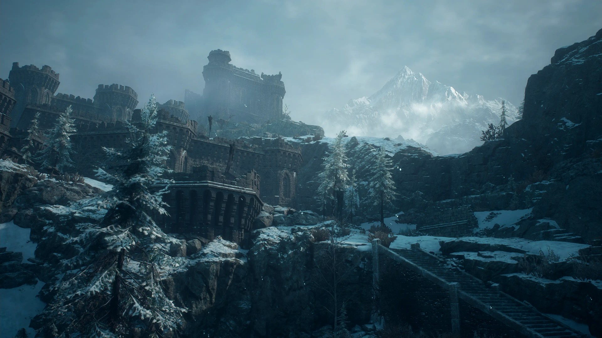 Snow-covered castle ruins on a cliff below a mountain peak in Norgan, the new region in Dragon's Dogma 2 Dark Arisen