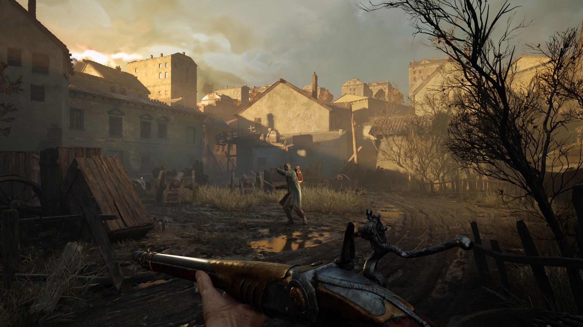 A ruined village street at dusk in Valor Mortis, seen in first person with a flintlock pistol in hand.
