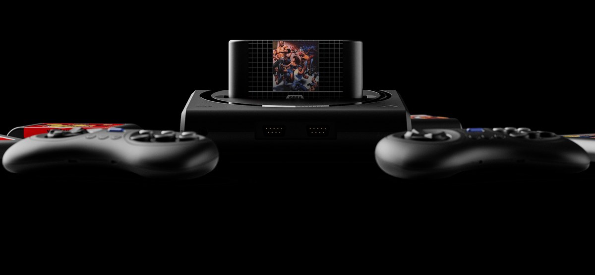 The Analogue Mega Sg+ with a cartridge inserted and two controllers