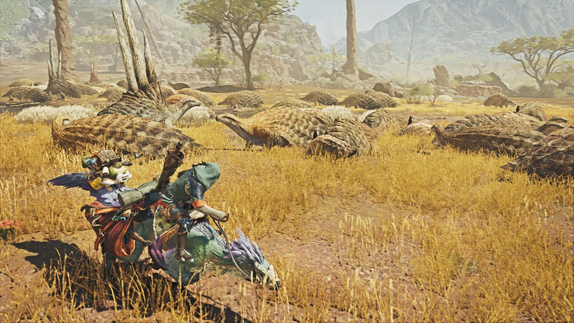 A hunter rides a Seikret across golden grassland toward distant herds in Monster Hunter Wilds