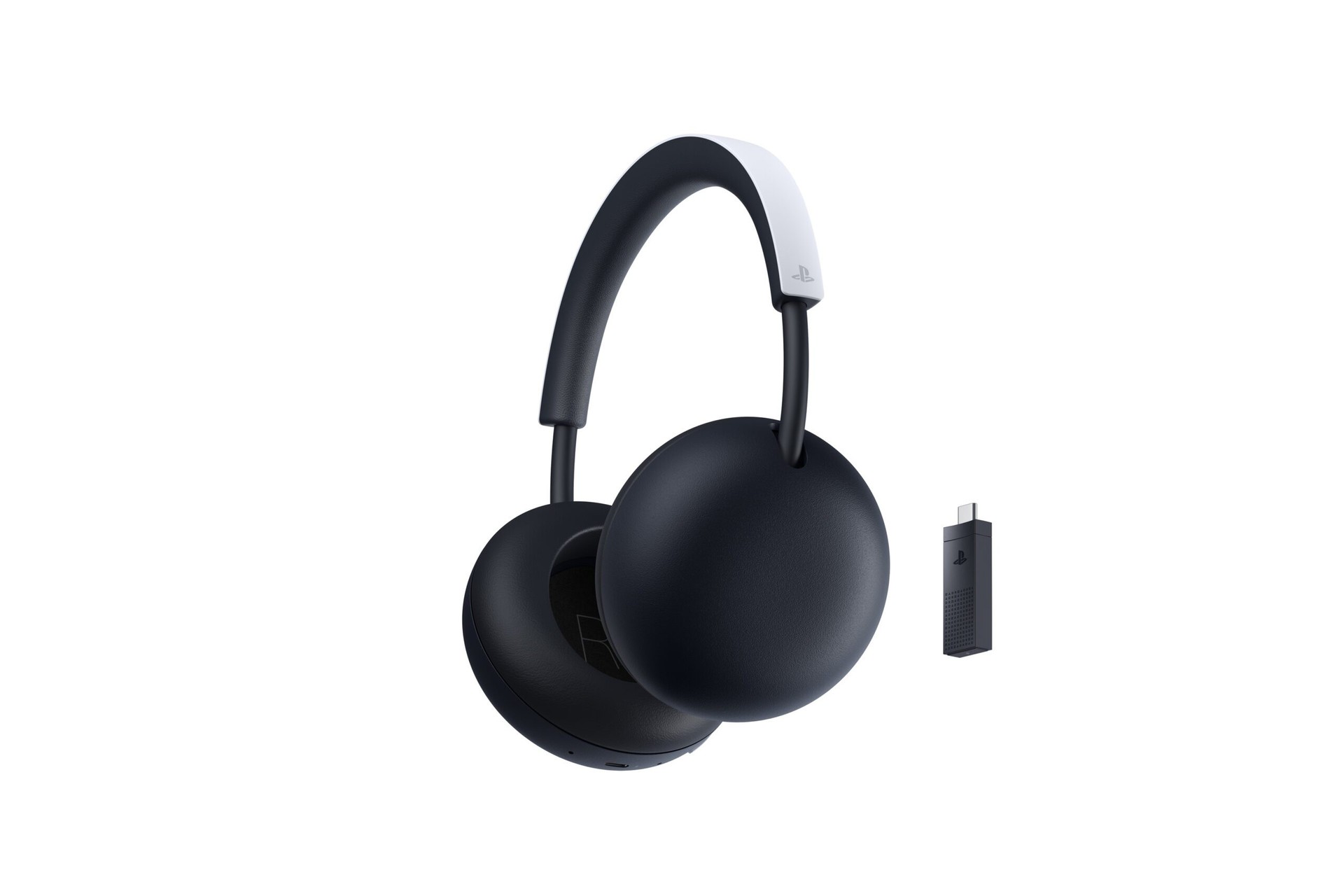 PlayStation Pulse wireless headset in white with its PlayStation Link USB-C adapter