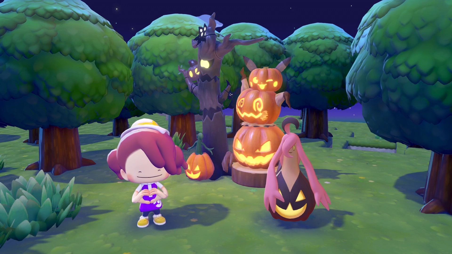 Gourgeist stands beside a stack of glowing jack-o'-lanterns in the woods at night in Pokémon Pokopia