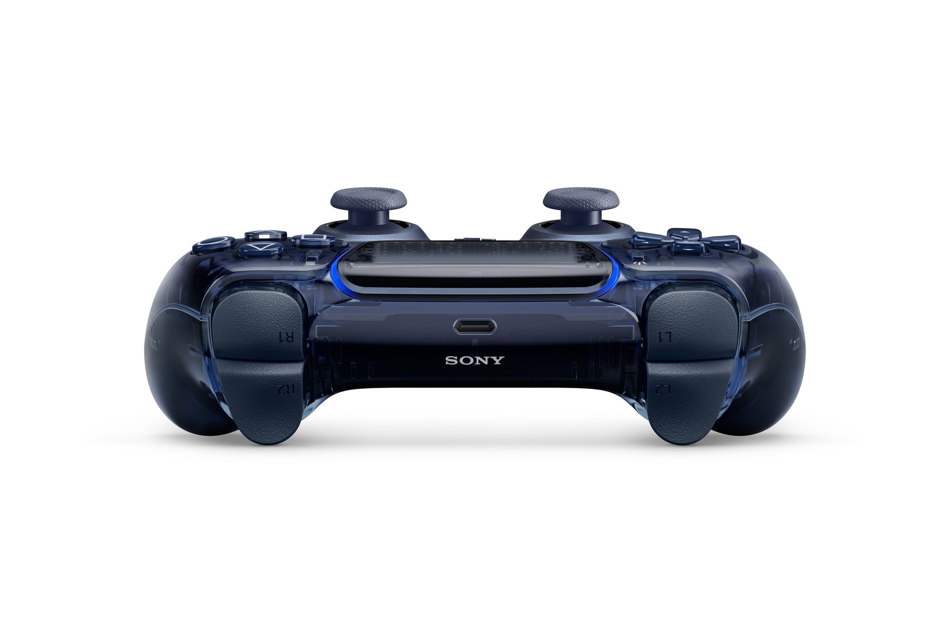 A Graphite Gray transparent DualSense controller seen from the front edge