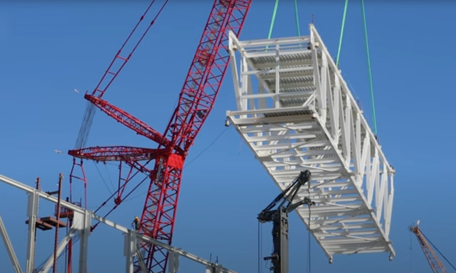 Steel box truss being lifted into place at Micron's first Idaho memory fab