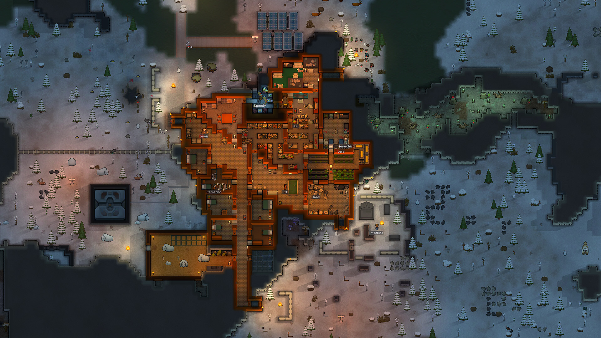 A snowy RimWorld colony glows with lights at night