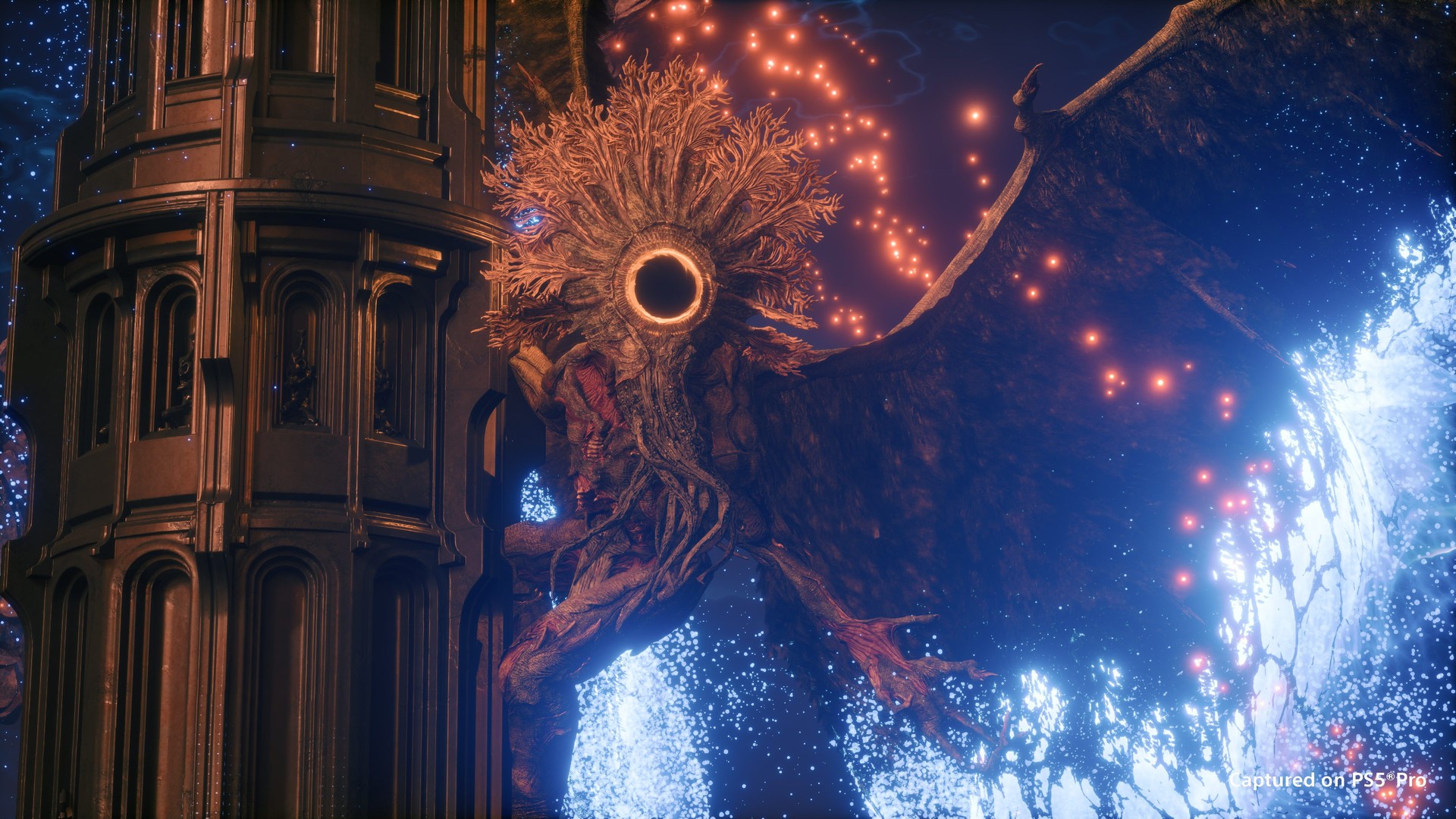A towering root-covered Overlord stands beside a bronze tower under a cracked blue light in Saros