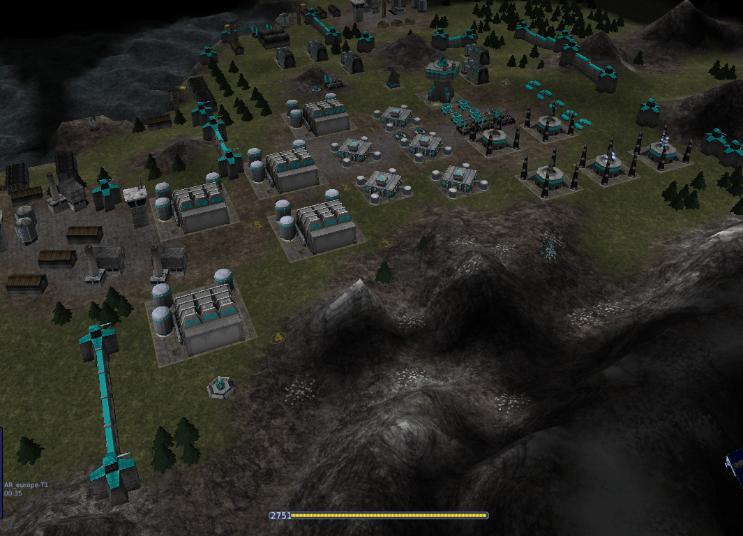 A sprawling Warzone 2100 base of factories, research facilities, and walls on a hillside